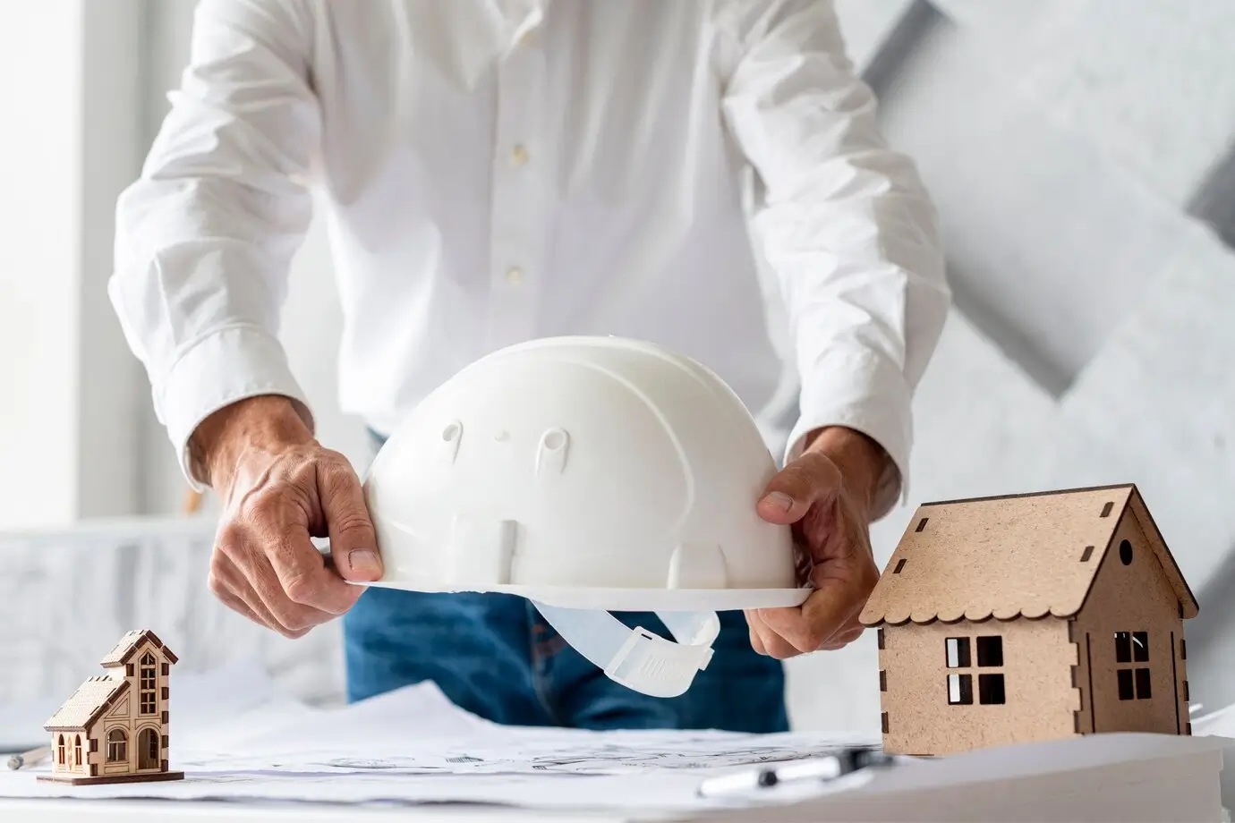 business-man-holding-safety-helmet